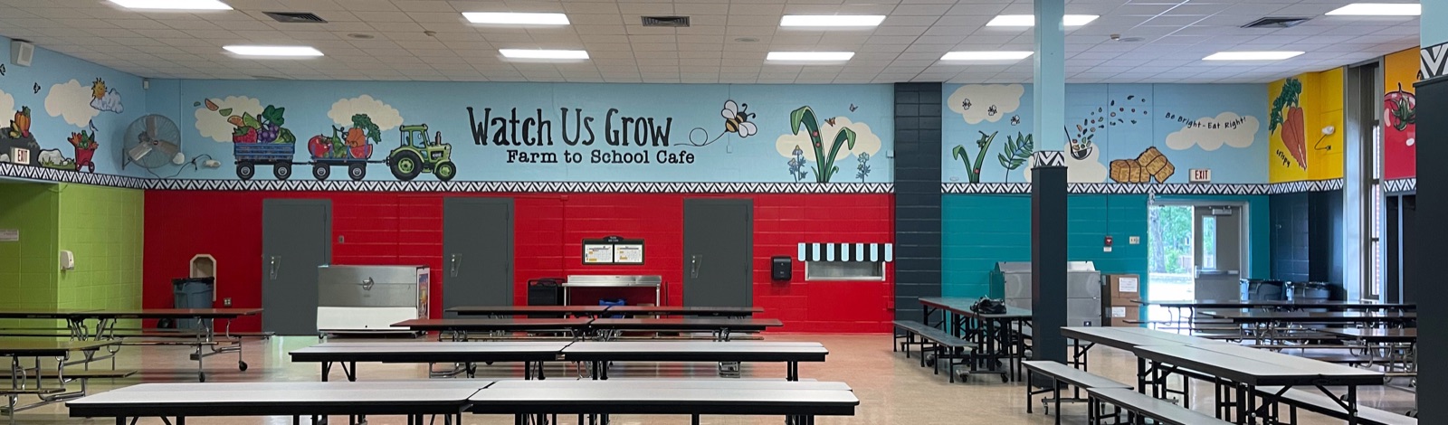 Watch Us Grow Farm to School Cafe mural above a school cafeteria serving line